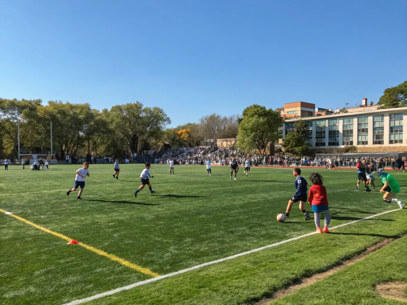 A vibrant image of young people playing soccer and basketball in a community sports field, smiling and engaging actively. The scene captures the energy and teamwork fostered by 3MTKD's youth sports programs.